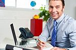 Businessman Preparing Reports Stock Photo