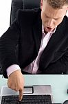 Businessman Pressing Laptop Key Stock Photo