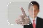 Businessman Pushing  Button Stock Photo