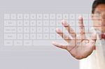 Businessman Pushing Keyboard Stock Photo