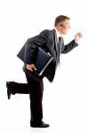 Businessman Running With Briefcase Stock Photo