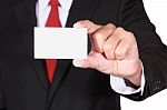 Businessman Showing Blank Card Stock Photo