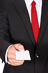 Businessman Showing Blank Card Stock Photo