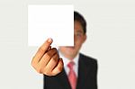 Businessman Showing Blank Paper Stock Photo