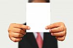 Businessman Showing Blank Paper Stock Photo