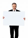 Businessman Showing White Board Stock Photo