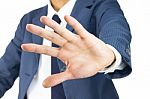 Businessman Stop Sign Hand Gesture On Tilt View Stock Photo