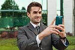 Businessman Taking Selfie Stock Photo