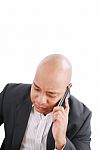 Businessman Talking On Mobile Phone Stock Photo