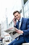 Businessman Talking On The Mobile Phone Stock Photo