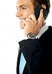 Businessman Talking Over Phone Stock Photo