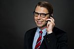 Businessman Talking Over Phone Stock Photo