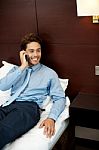 Businessman Talking Over Phone Stock Photo