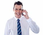 Businessman Talking Over Phone Stock Photo