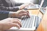 Businessman Team Working At Office Desk And Using A Digital Comp Stock Photo