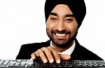 Businessman Typing On Keyboard Stock Photo