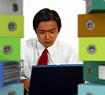 Businessman Using Laptop Stock Photo