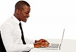 Businessman Using Laptop Stock Photo