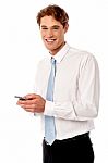 Businessman Using Mobile Phone Stock Photo