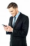 Businessman Using Mobile Phone Stock Photo