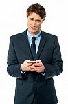 Businessman Using Mobile Phone Stock Photo