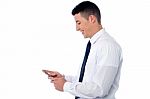 Businessman Using Mobile Phone Stock Photo