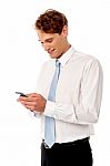 Businessman Using Mobile Phone Stock Photo