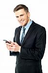 Businessman Using Mobile Phone Stock Photo