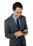 Businessman Using Phone Stock Photo