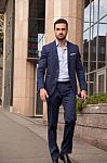 Businessman Walking Stock Photo