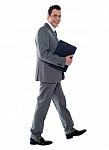 Businessman Walking Stock Photo