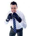 Businessman Wearing Boxing Gloves Stock Photo