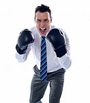 Businessman Wearing Boxing Gloves Stock Photo