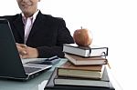businessman With Apple And Books Stock Photo