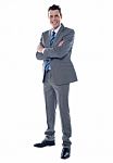 Businessman With Arms Crossed Stock Photo