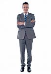 Businessman With Arms Crossed Stock Photo