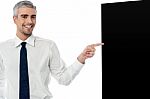 Businessman With Black Panel Stock Photo