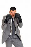 Businessman With Boxing Gloves Stock Photo