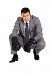 Businessman With Boxing Gloves Stock Photo