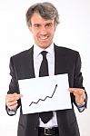 Businessman With Chart Stock Photo