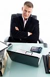 Businessman With Crossed Arms Stock Photo