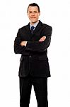 Businessman With Crossed Arms Stock Photo