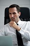 Businessman With Earphones Stock Photo