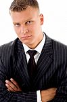 Businessman With Folded Hands Stock Photo