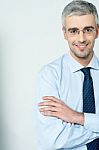 Businessman With His Arms Crossed Stock Photo