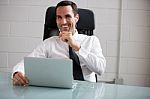 Businessman With Laptop Stock Photo