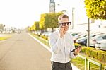 Businessman With Mobile Phone And Tablet In Hands Stock Photo