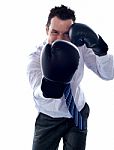 Businessman With Punching Pose Stock Photo