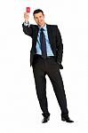 Businessman With Red Card Stock Photo