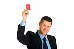 Businessman With Red Card Stock Photo